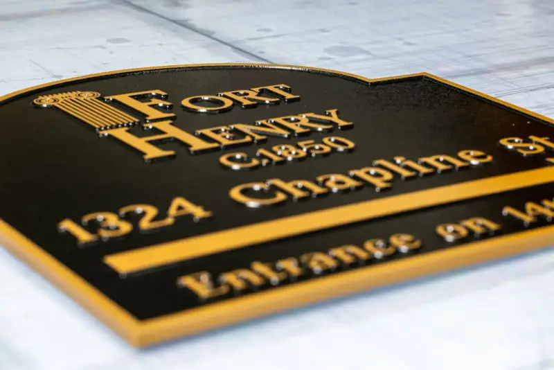 Engraved Fort Henry plaque in black and gold